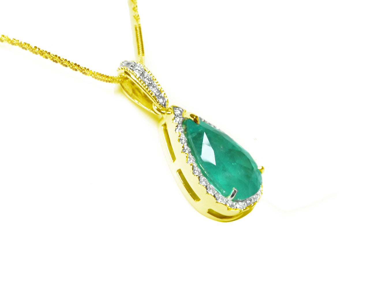 18K yellow gold pendant with a natural emerald teardrop-shaped gemstone on a right-side position top and gallery view.