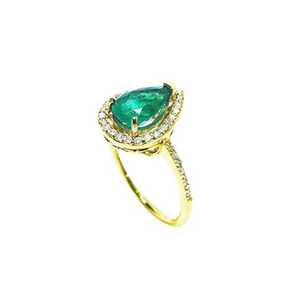 A yellow gold emerald ring with the top and band on side profile position.