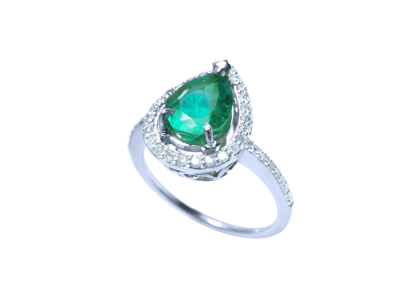 Pear shaped natural emerald ring in white gold, top and side perspective view.