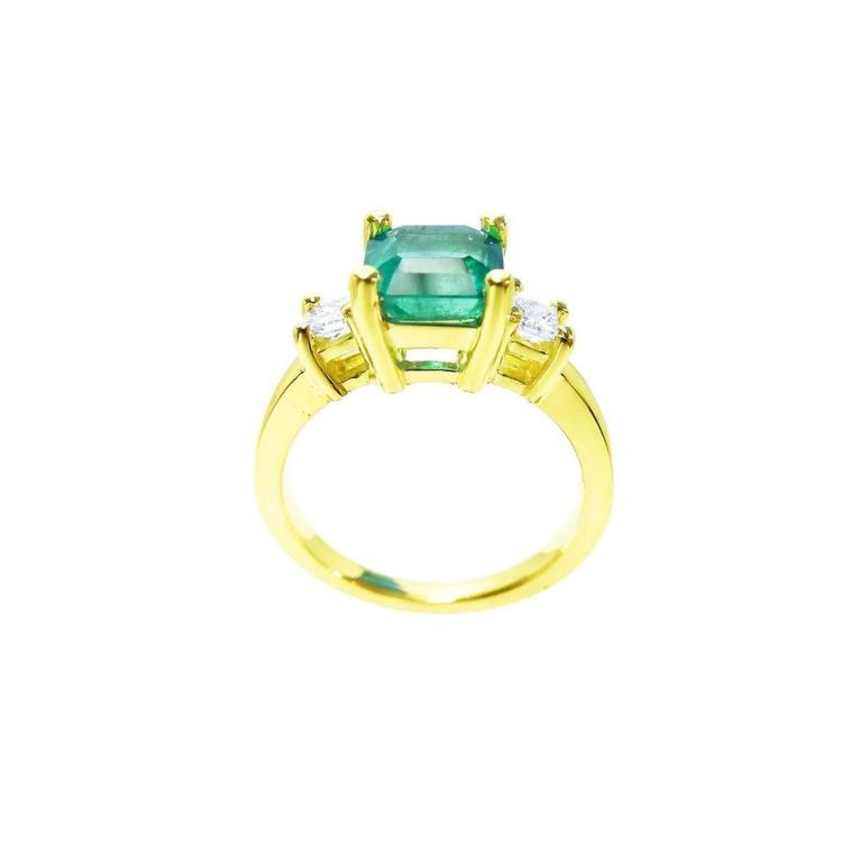 18K yellow gold three-stone ring with a square emerald and princess-cut side diamonds.