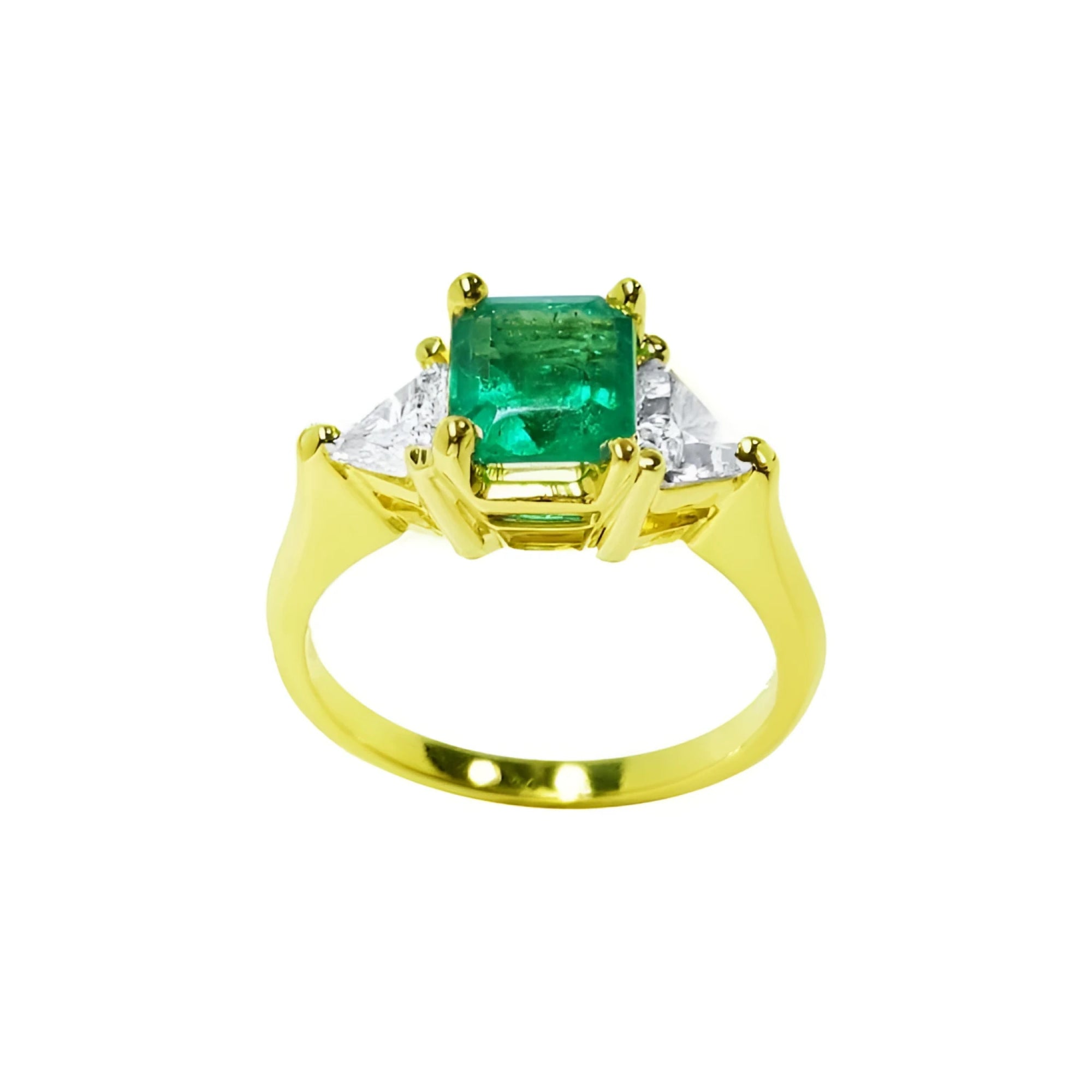 1.27 ct natural Colombian emerald three-stone ring with trillion diamonds in 18K yellow gold.
