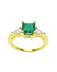 Natural colombian emerald with teardrop diamonds side ring for Mother's Day gift in yellow gold.