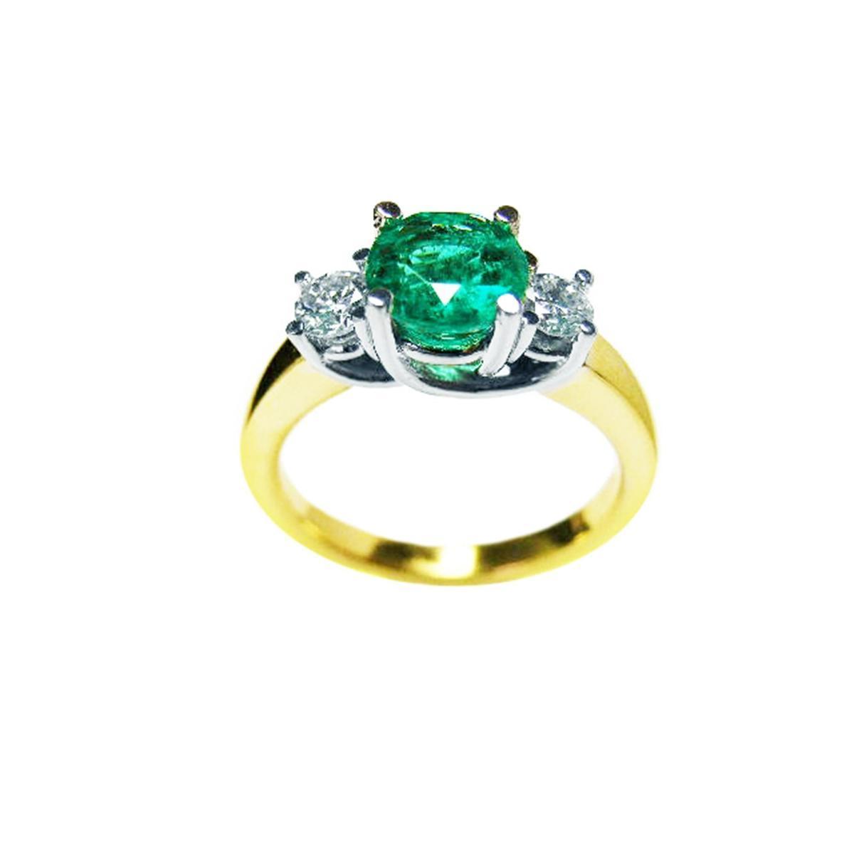 This 14k gold round emerald and side diamonds ring is on a top and lateral profile display.