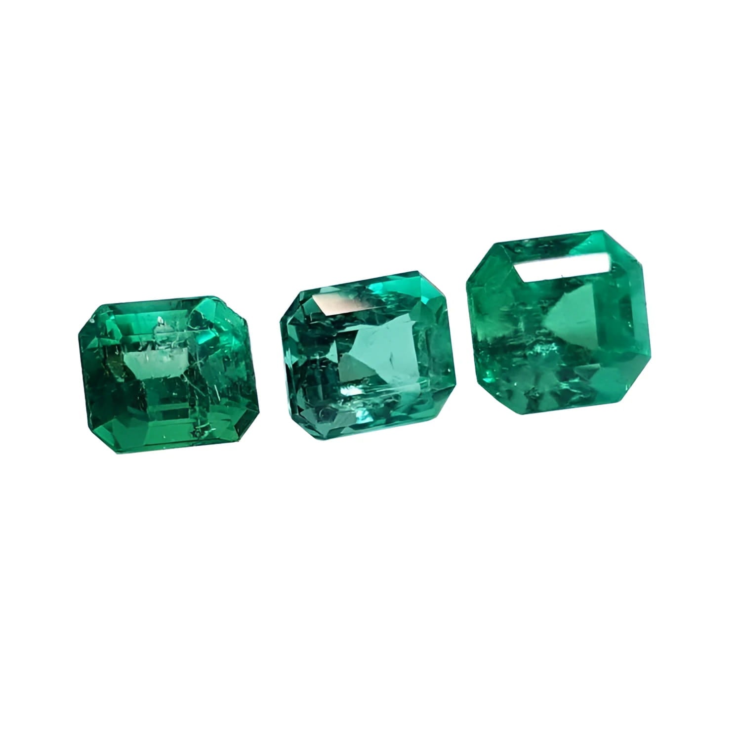 Three emerald-cut natural green emeralds, 1.93 carat matching set for jewelry.