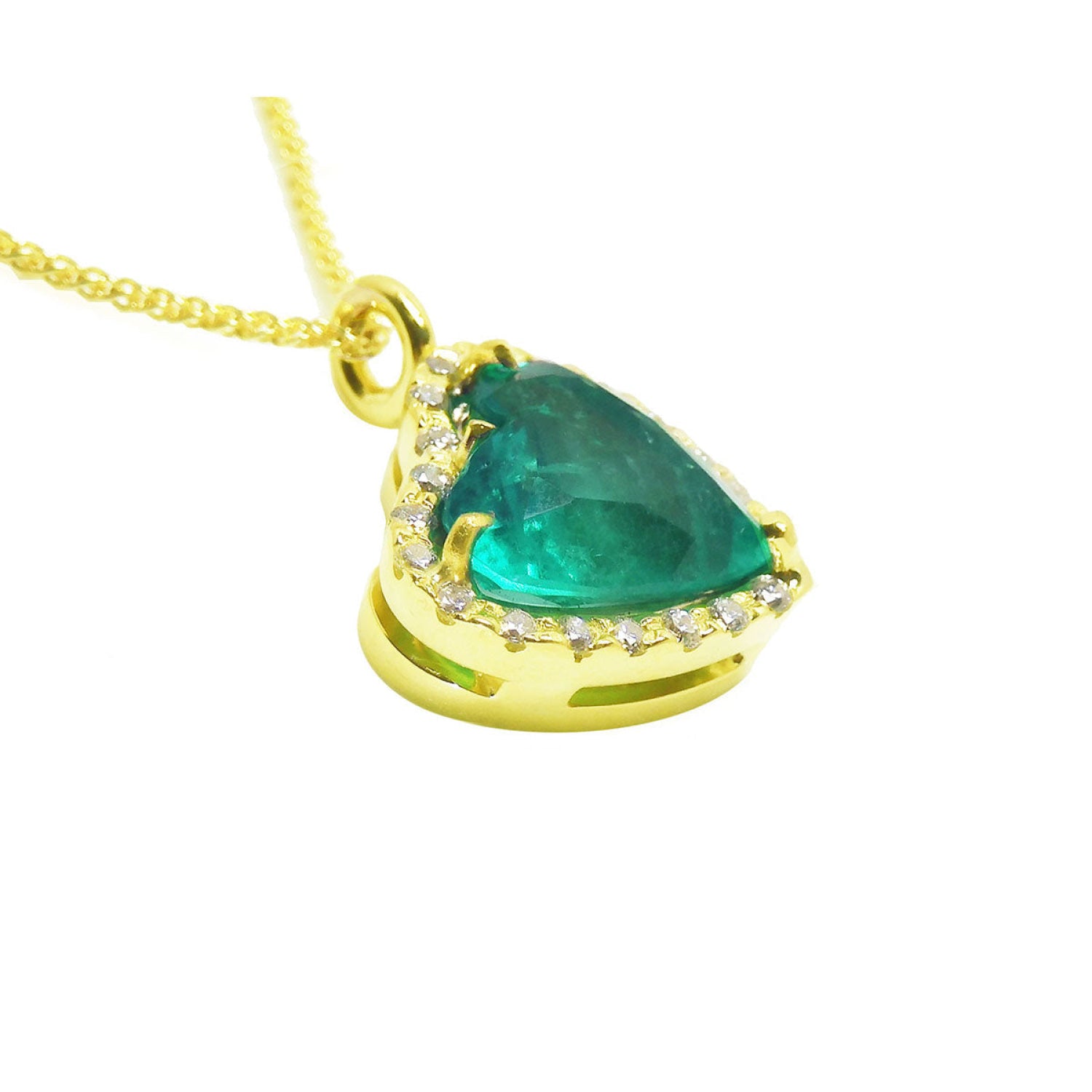 Tilted heart emerald necklace with halo diamonds in 18K yellow gold.
