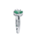 Negative space Toi et Moi ring the emerald showcases fine quality with its distinctive fancy cut, while the geometric trillion diamond creates striking visual contrast.