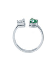 Toi et Moi ring features a half-moon-shaped natural Colombian emerald and a trillion-cut diamond, handcrafted in 18k solid white gold.