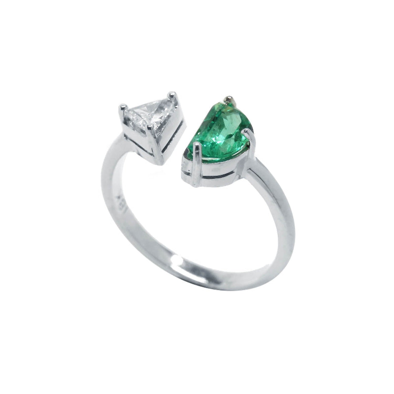 Handcrafted in 18k solid white gold this emerald is a fancy cut fine quality negative space Toi et Moi ring.