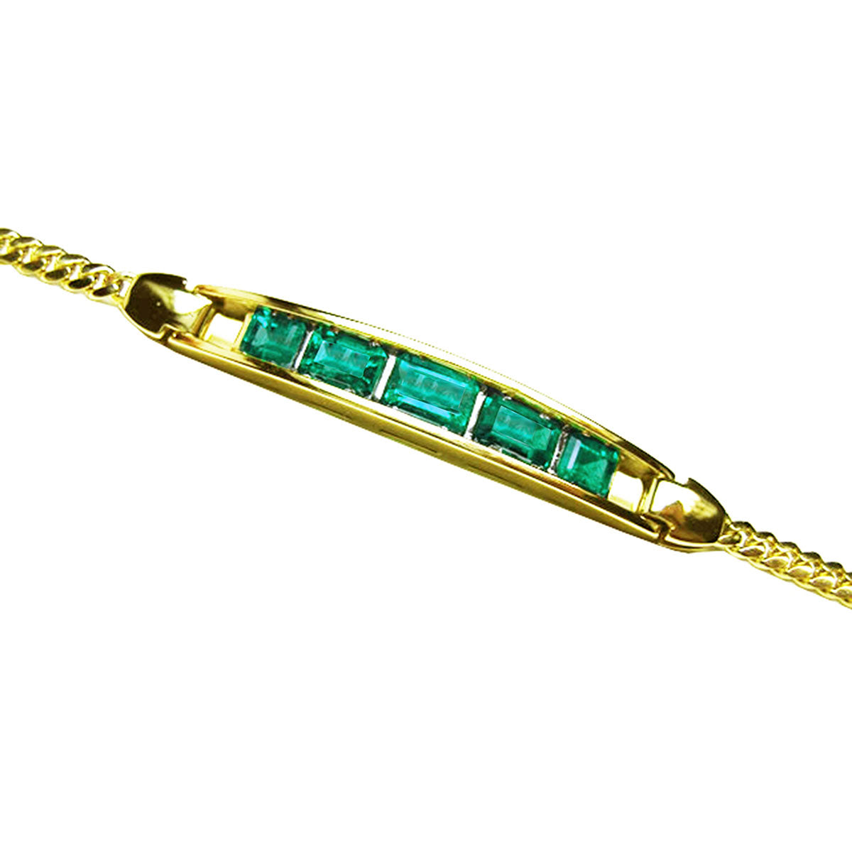 Gold bracelet with five natural colombian emeralds high quality on a topside vie position.