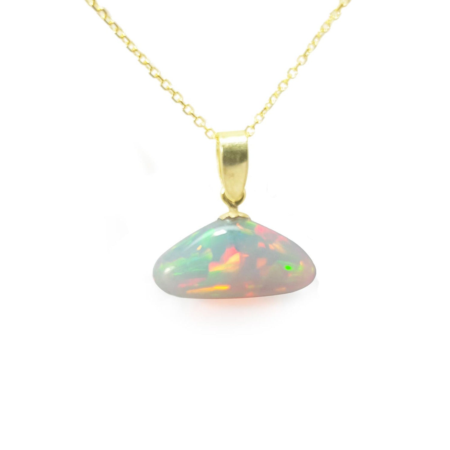 Opal pendant necklace on a gold chain topside view position against a white background.