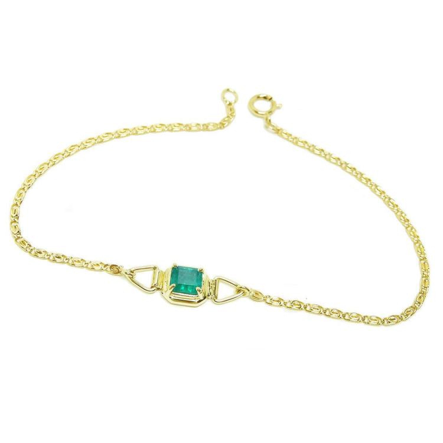 14K yellow gold solitaire bracelet with a deep green Colombian emerald.