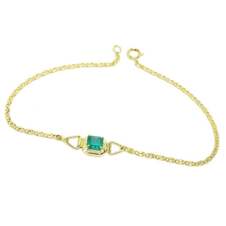 14K yellow gold solitaire bracelet with a deep green Colombian emerald.