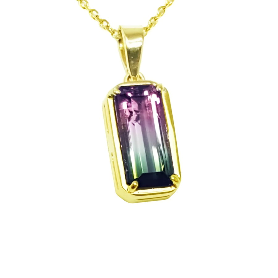 2.50 ct. watermelon tourmaline pendant with pink and blue-green hues in 14K yellow gold.