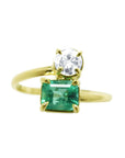 Two-stone natural Colombian emerald and diamond ring You and Me design, also known as a Toi et Moi ring, in 18k yellow gold.