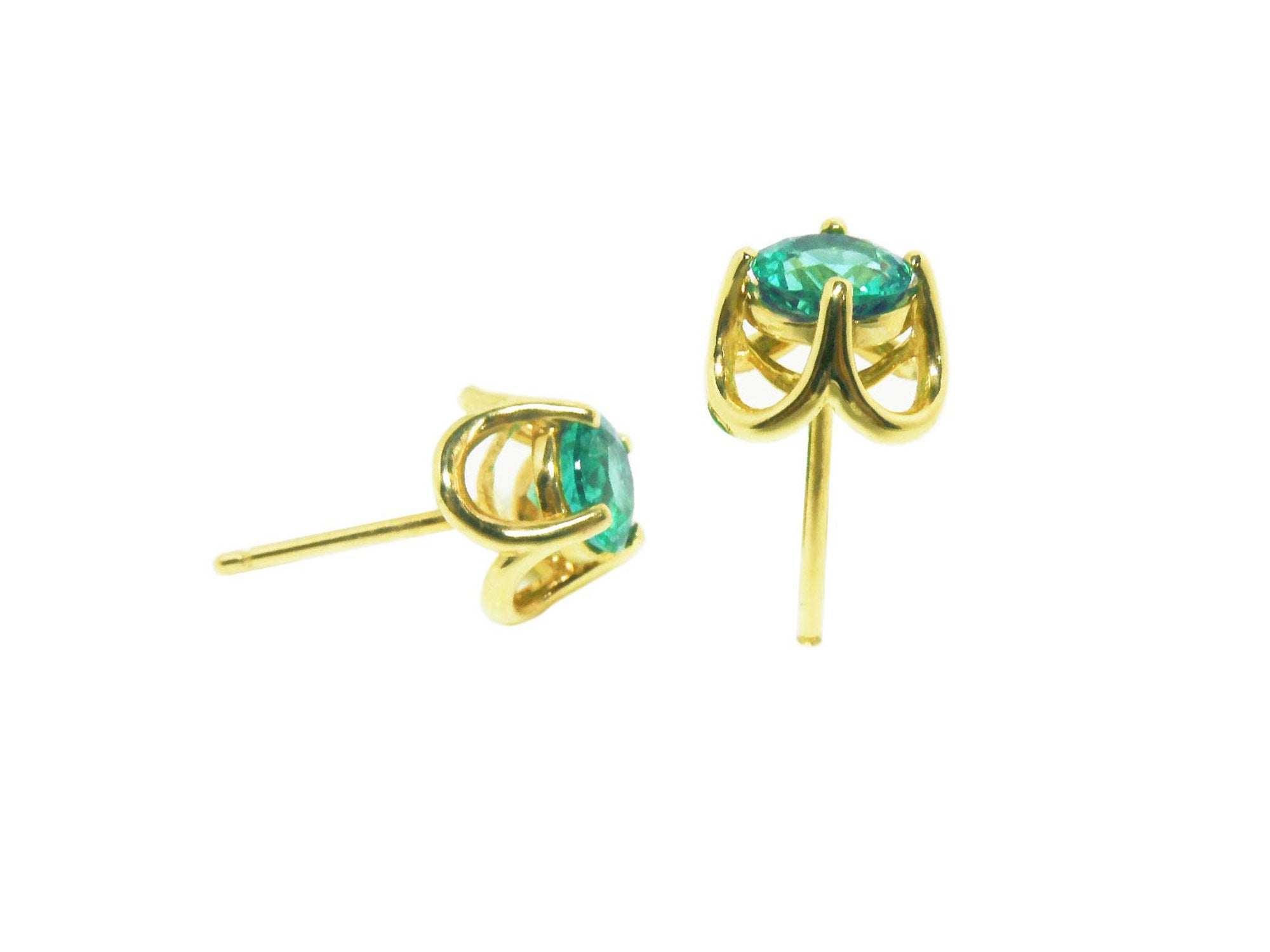 Yellow gold Tulip emerald stud earrings, underside profile view.
