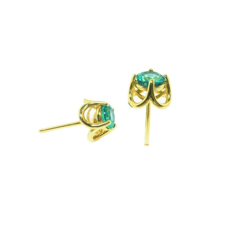 Colombian emerald tulip stud earrings in 14K yellow gold with secure push backs.