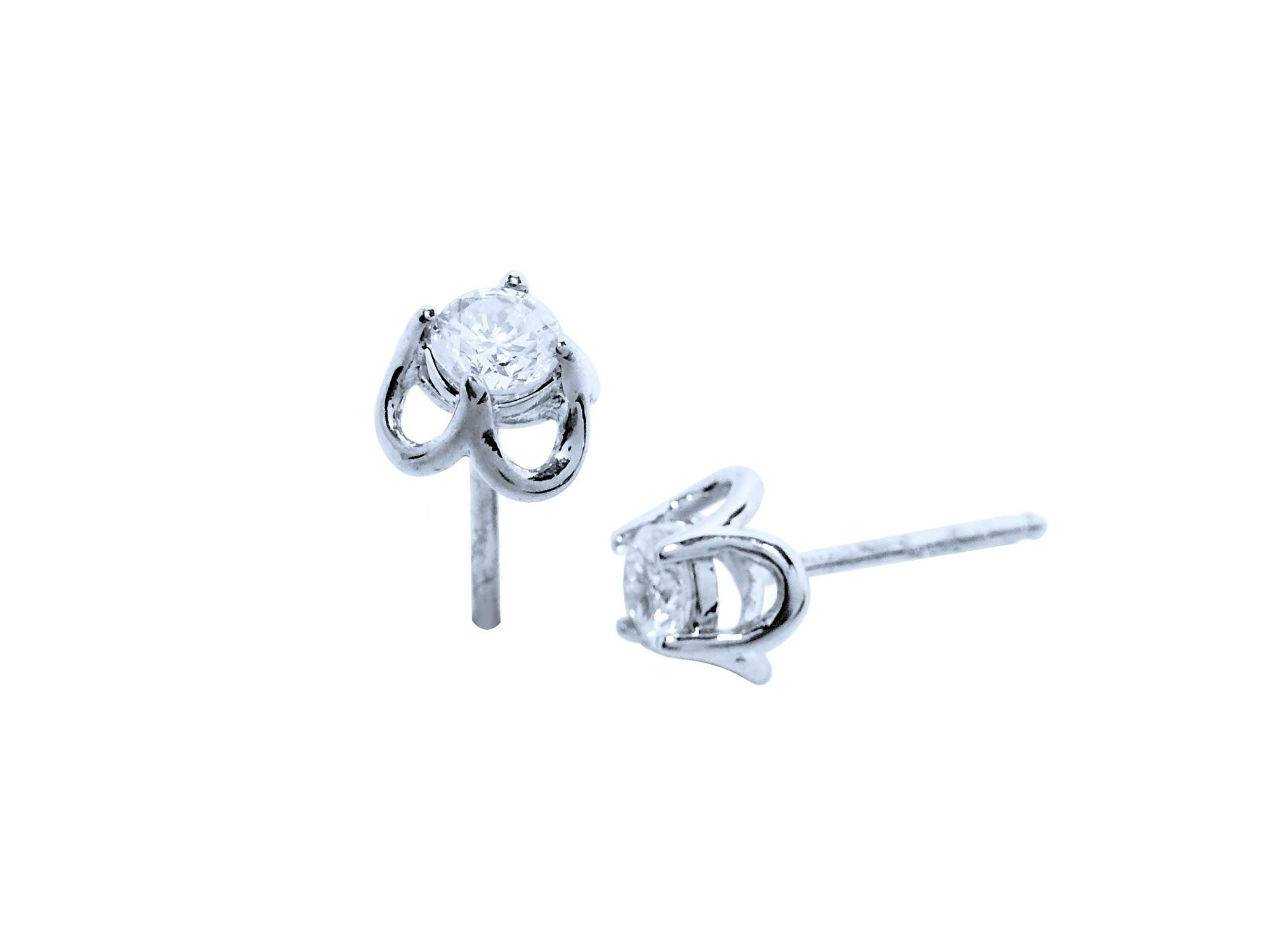 A pair of natural diamond tulip stud earrings, top and side view profiles,