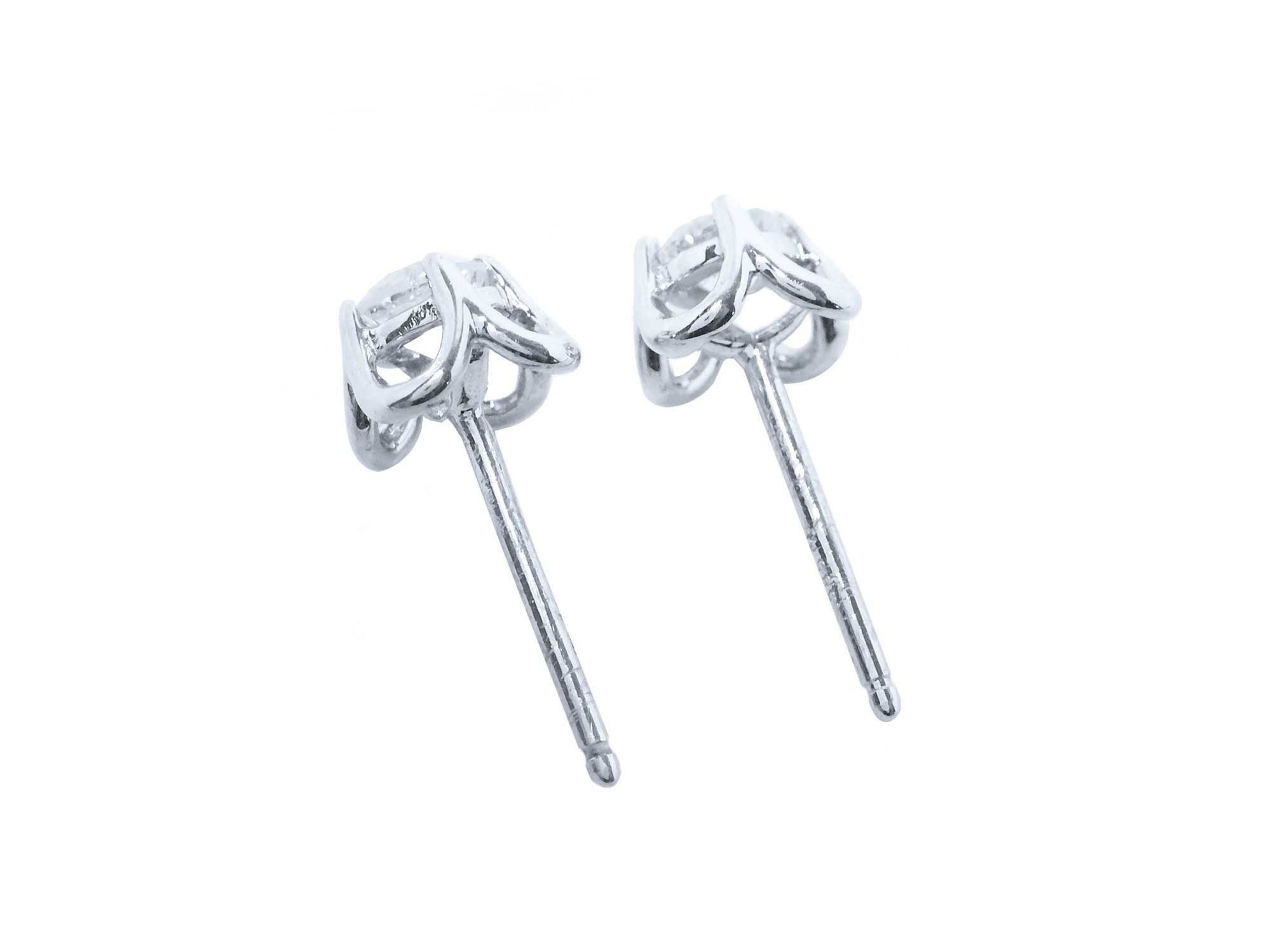 14k white gold of natural diamond tulip stud earrings, downside view profile.