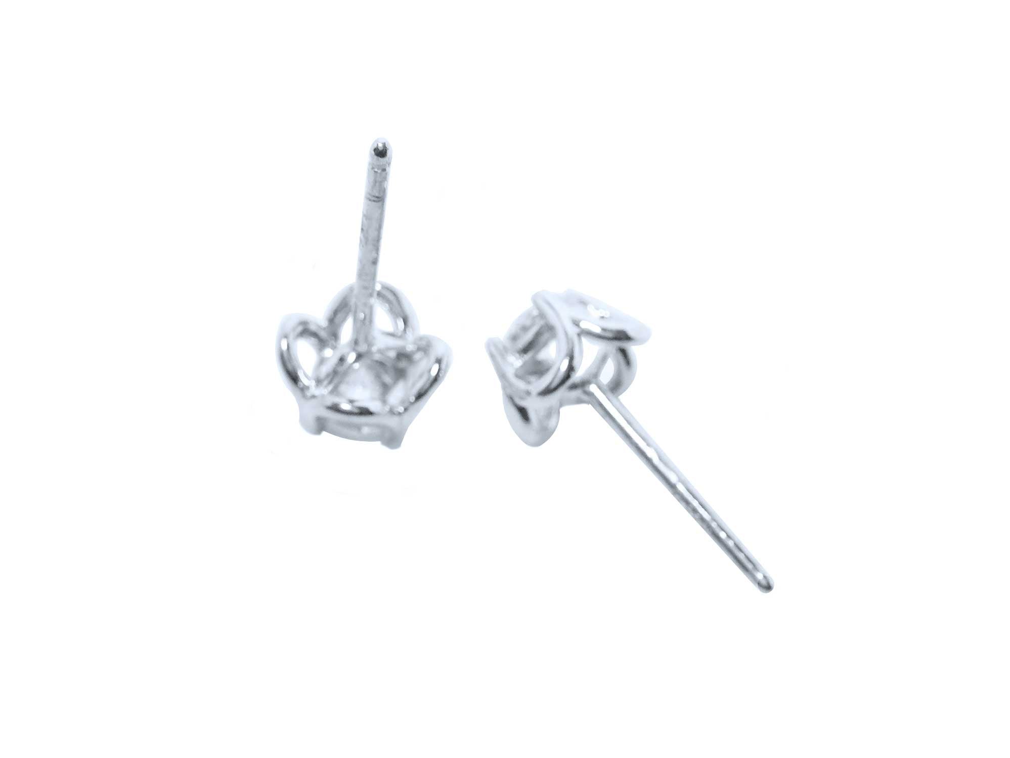 Upside down position for the view of push backs diamond stud earrings, white gold. 