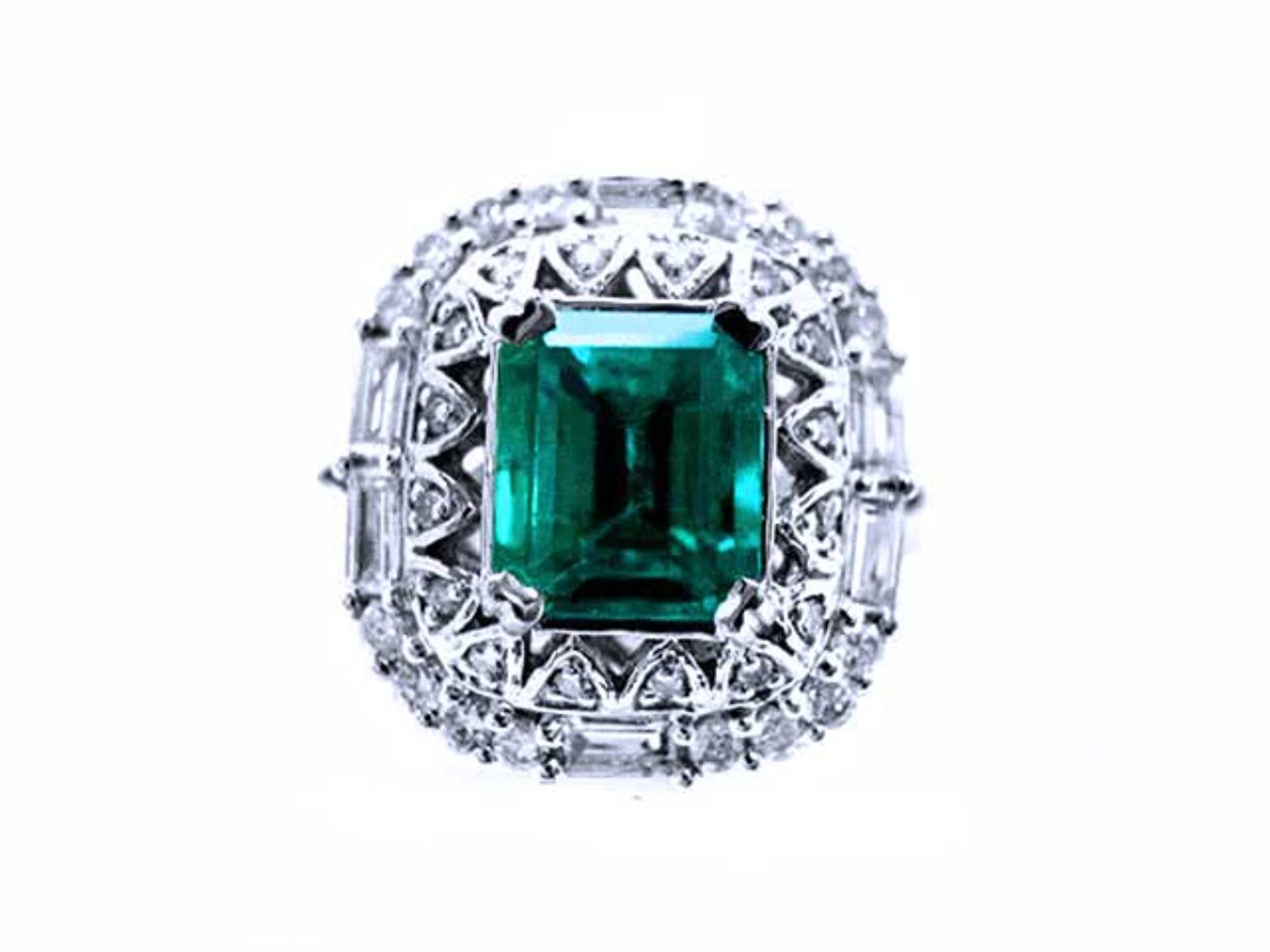 A square emerald-cut surrounded by diamonds, this vintage Colombian emerald ring displays the top side view.