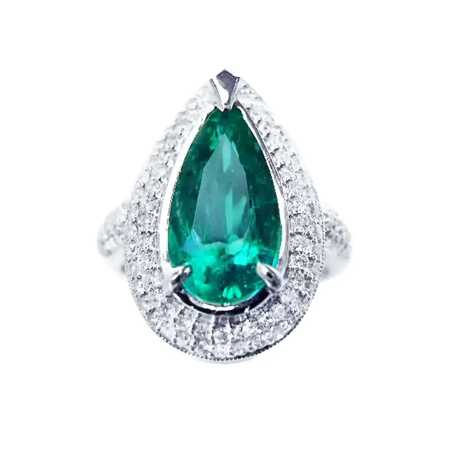 Esmeralda corte pera o lagrima rodeada de diamantes naturales en anillo de oro blanco para mujer.