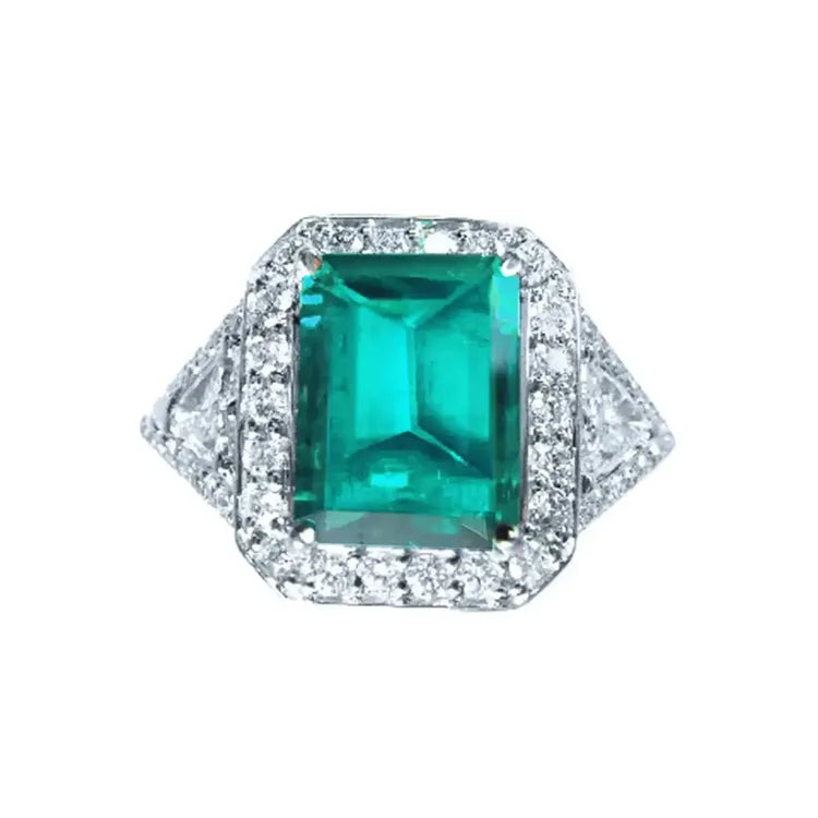Este anillo para mujer con esmeralda y diamantes naturales está elaborado en oro blanco de 18k
