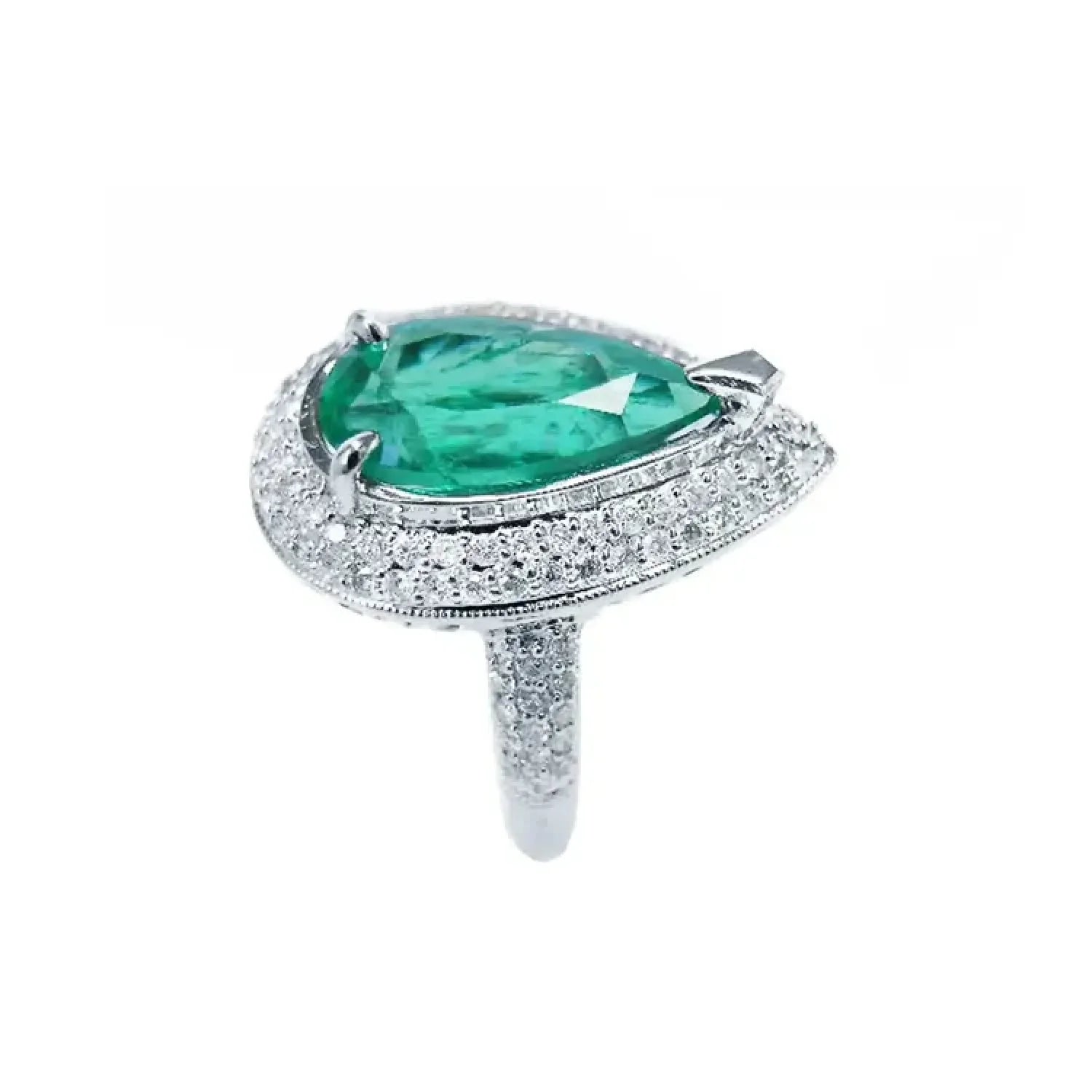 Anillo de oro blanco 14k con esmeralda colombiana corte pera 3.35 ct y diamantes.