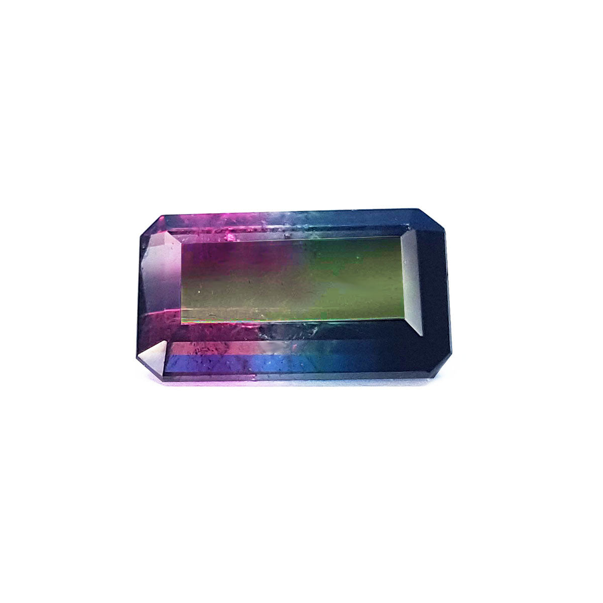 A rectangular emerald cut natural watermelon tourmaline from Brazil displaying the top table and crown facets.