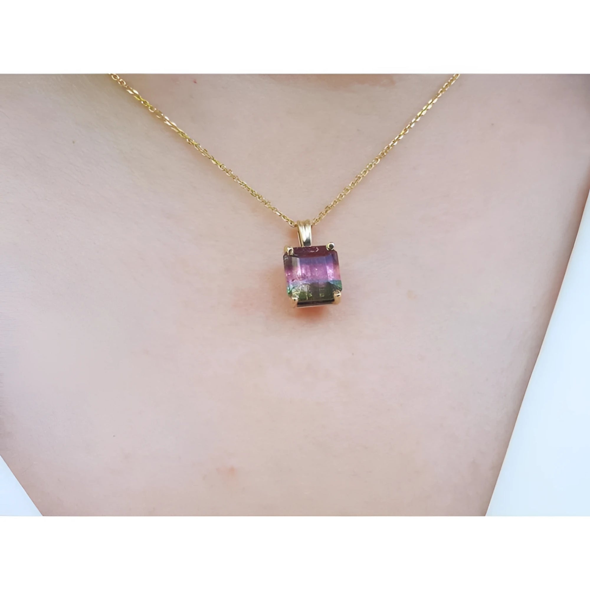 14K yellow gold pendant with a 4.01 ct bicolor red-orange and green tourmaline solitaire.