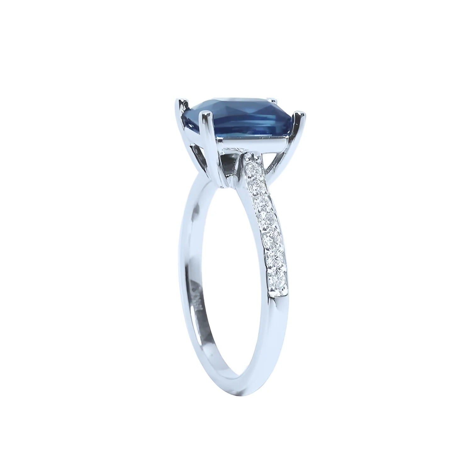 18K white gold ring with a radiant-cut deep blue sapphire and diamond accents.