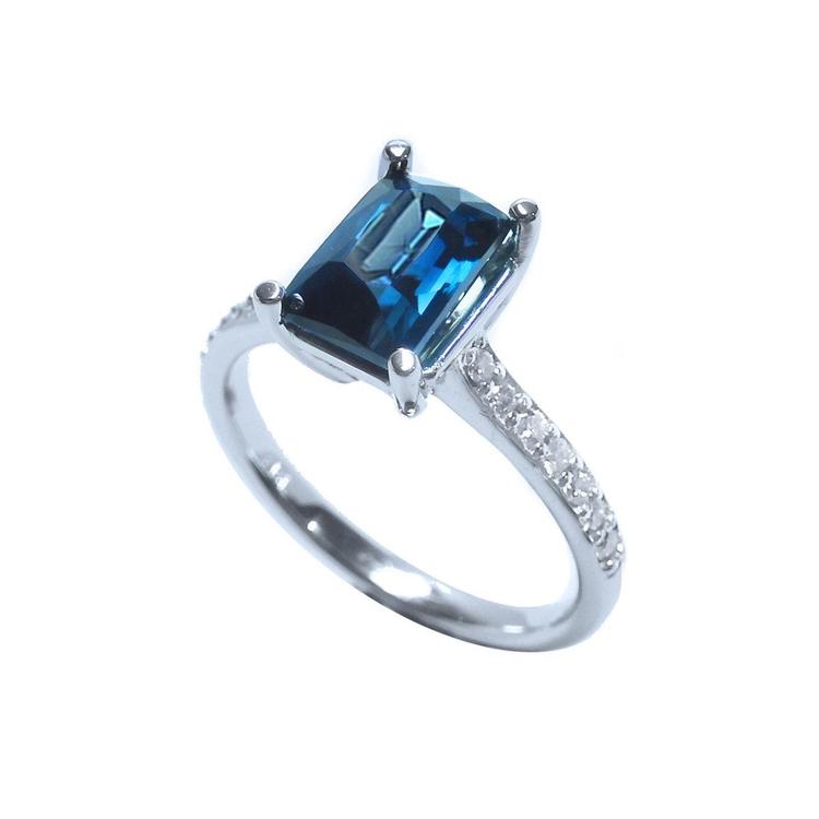 18k white gold blue sapphire ring for women sparkling radiant cut solitaire, tilted top shank profile view