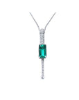 Women's 14K white gold necklace with a rectangular Colombian emerald and diamond accents.