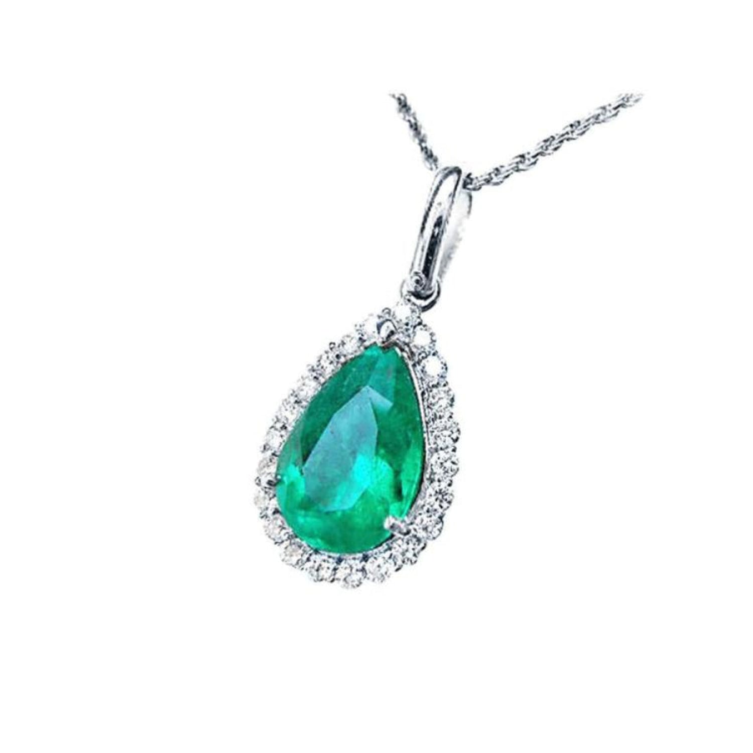 18K white gold pear-shaped emerald pendant with a halo of natural diamonds on a delicate chain.