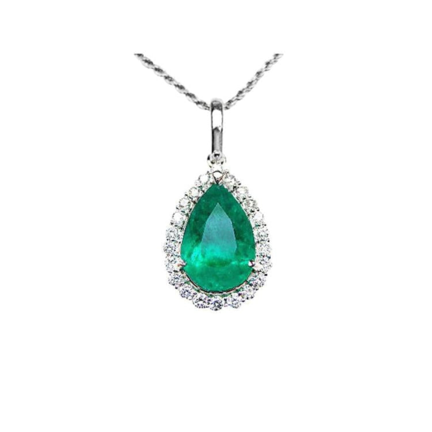 18K white gold pear-shaped emerald pendant with a halo of natural diamonds on a delicate chain.