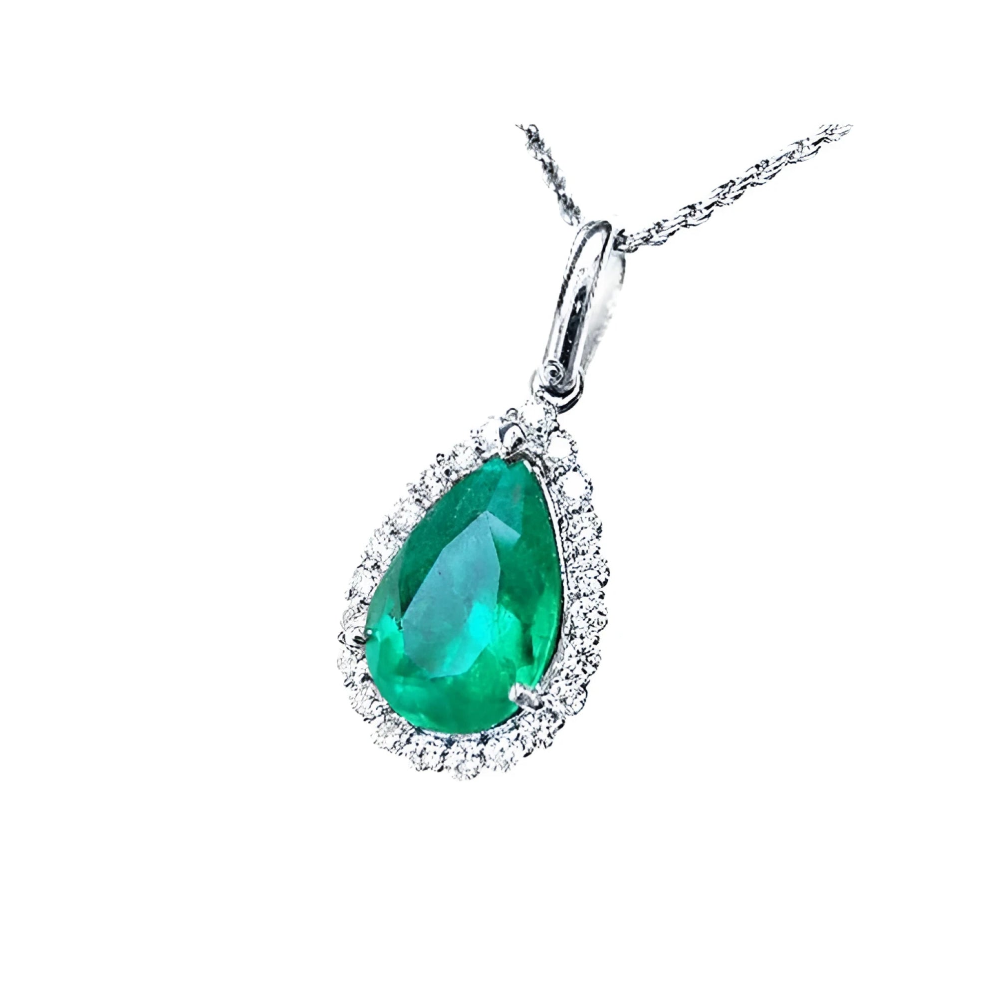 18K white gold pear-shaped emerald pendant with a halo of natural diamonds on a delicate chain.