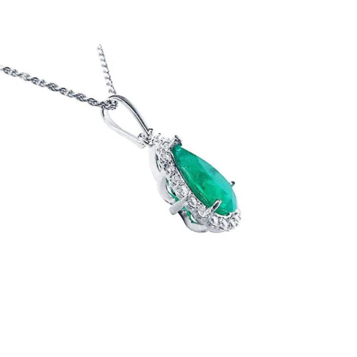 18K white gold pear-shaped emerald pendant with a halo of natural diamonds on a chain.