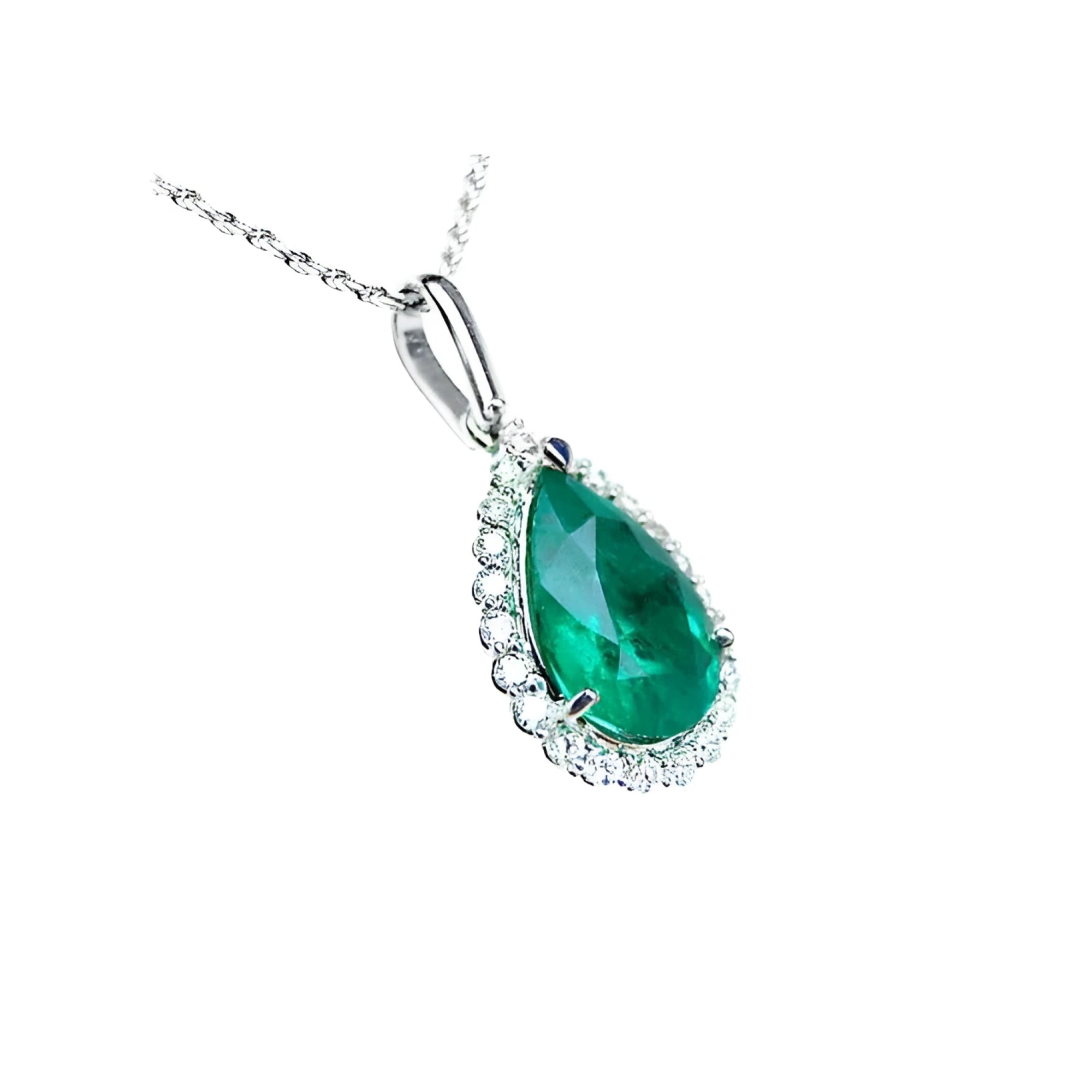 18K white gold pear-shaped emerald pendant with a halo of natural diamonds on a delicate chain.