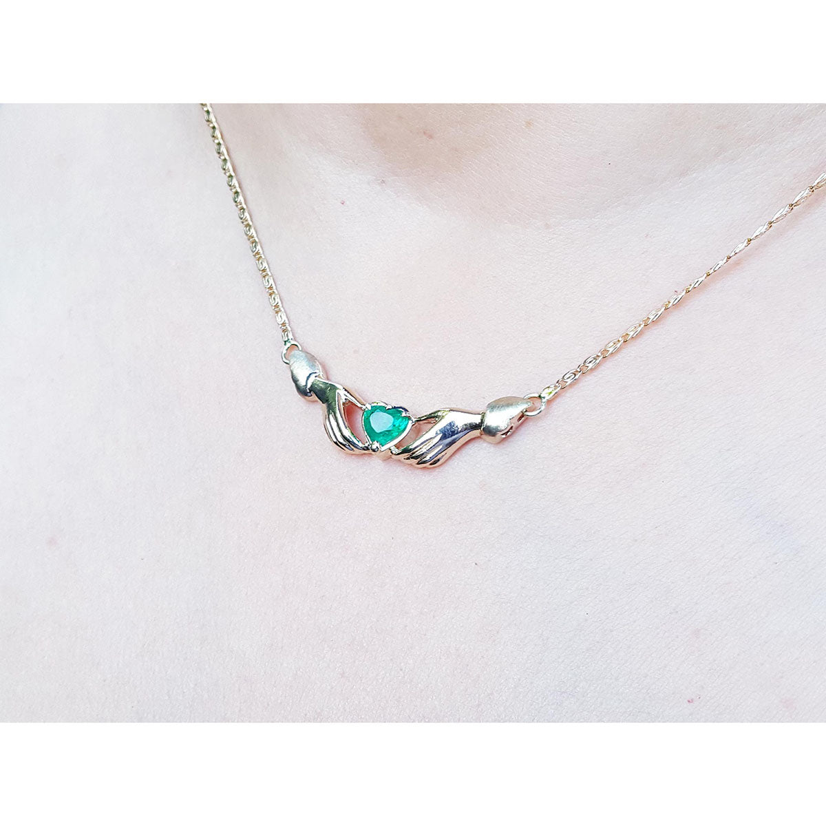 Colombian emerald claddagh necklace heart cut in 14k yellow gold on a lady&#39;s collar