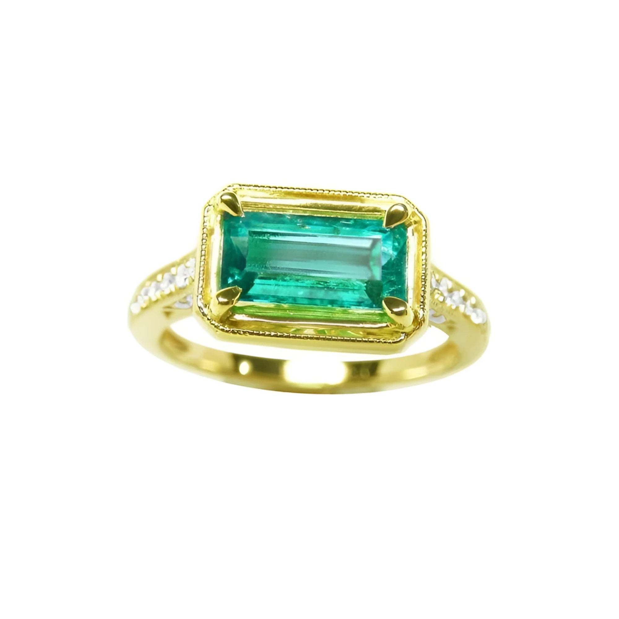 This 14k gold genuine colombian emerald ring displays the centered gemstone in prong set and accent diamonds.