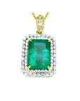 18K yellow gold emerald pendant with a rectangular emerald-cut stone and double halo natural diamonds.