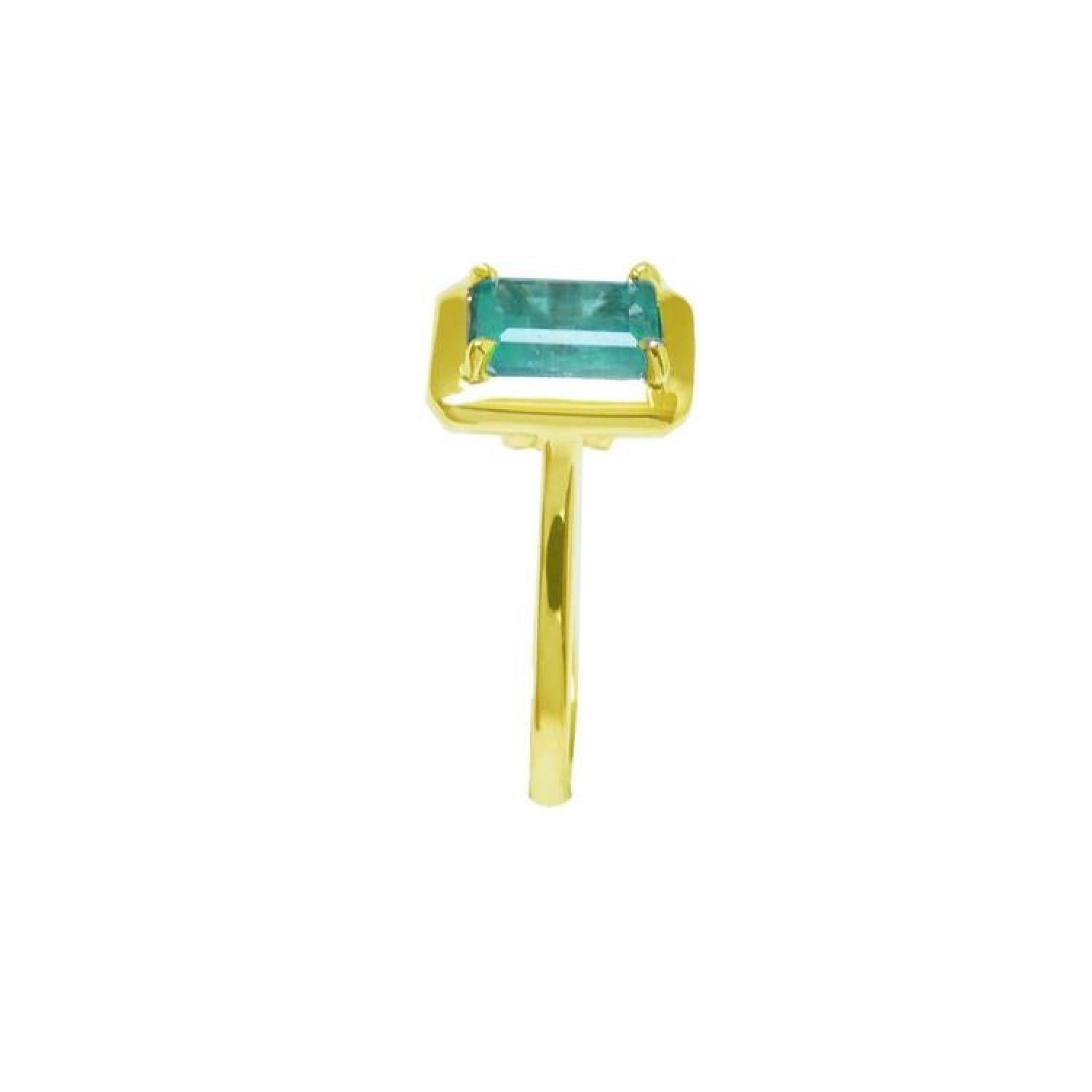 1.22 carat emerald-cut Muzo Colombian emerald solitaire ring in 14K yellow gold.
