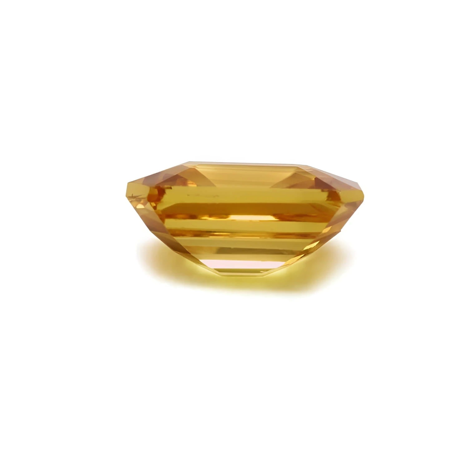 3.75 ct. loose natural emerald cut yellow sapphire from Sri Lanka.