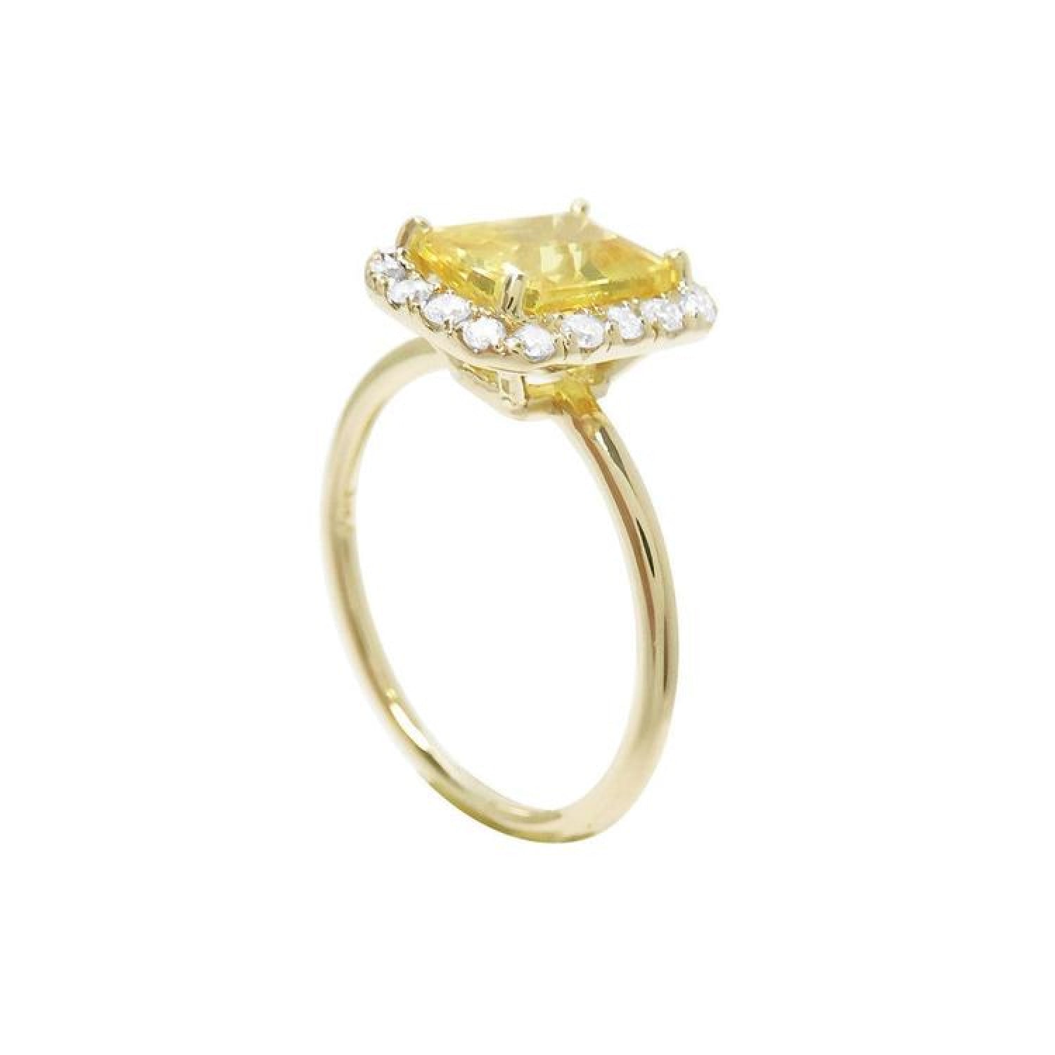 14K yellow gold ring with emerald-cut natural yellow sapphire and diamond halo.