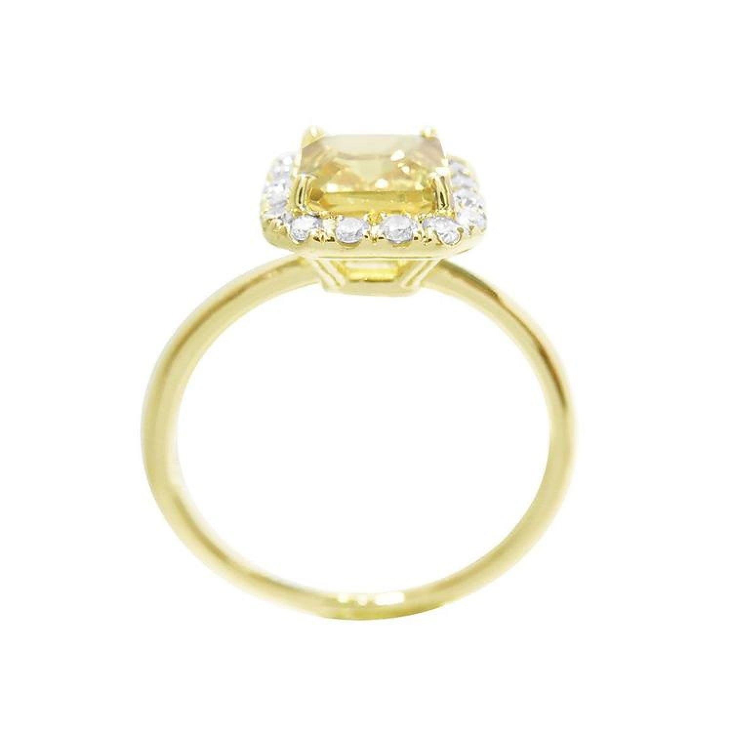 14K yellow gold ring with emerald-cut natural yellow sapphire and diamond halo.