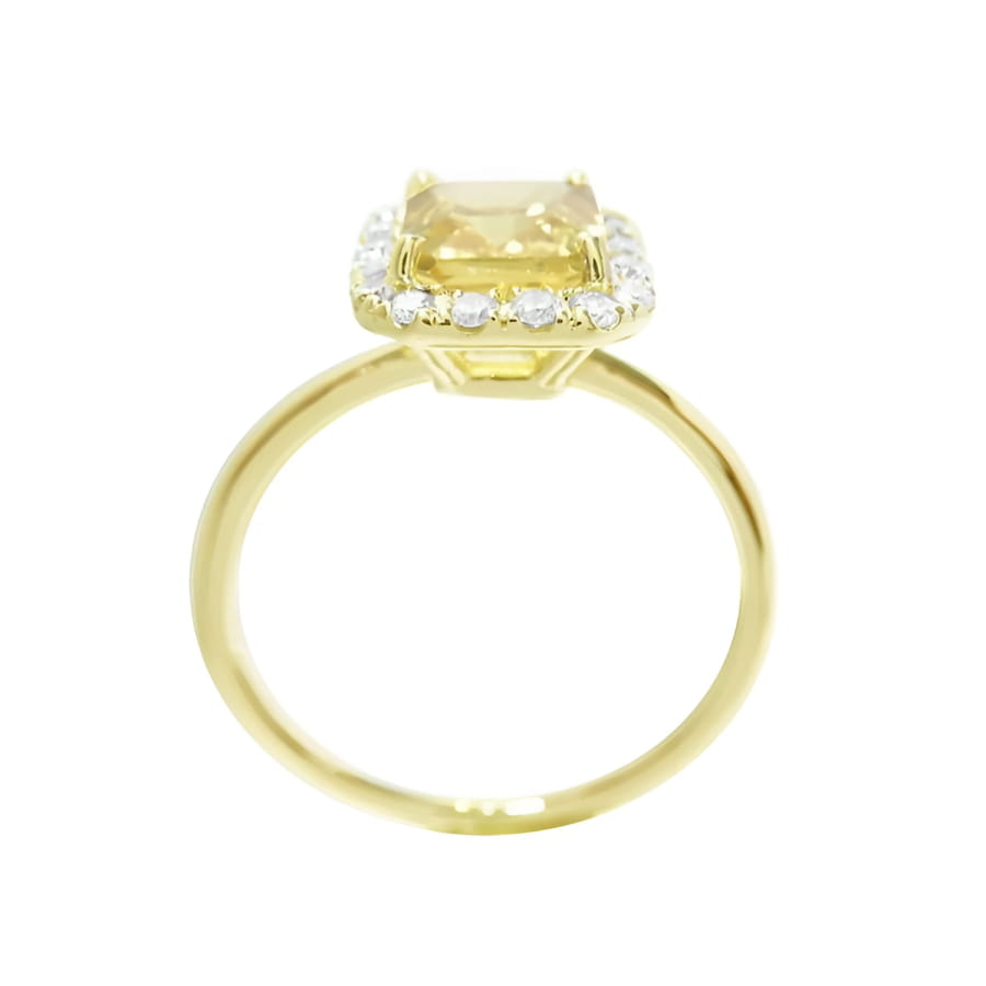 14K yellow gold ring with emerald-cut natural yellow sapphire and diamond halo.