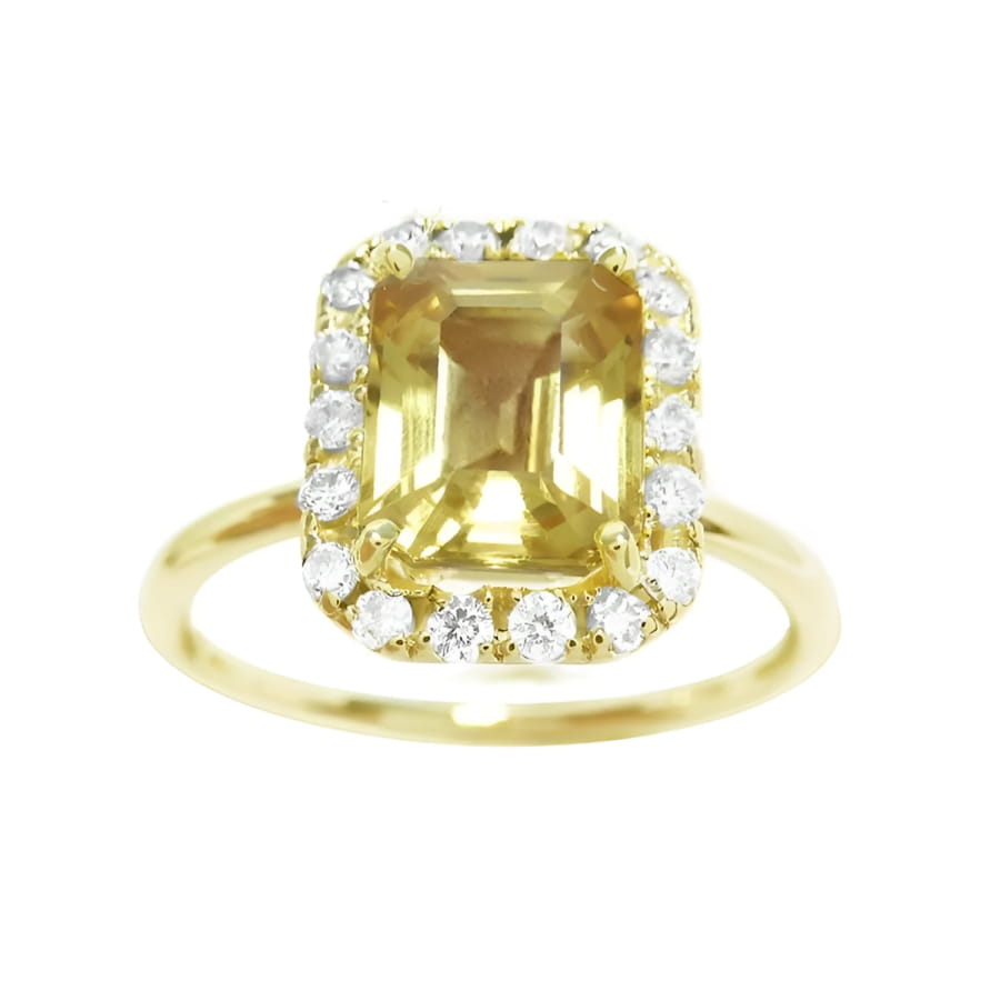 A natural yellow sapphire ring for women, featuring a vibrant canary yellow hue, set in a halo of diamonds on 14k gold.  