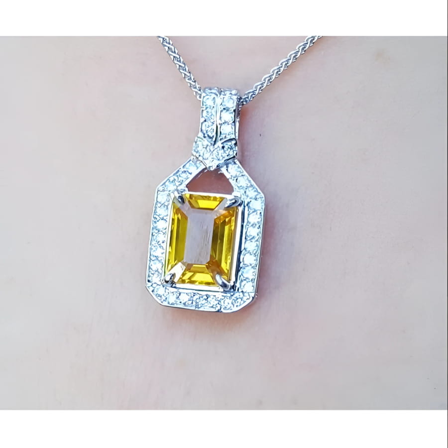 Natural yellow sapphire pendant necklace halo diamond crafted in 18k white gold, offering a refined and sophisticated accessory for women.